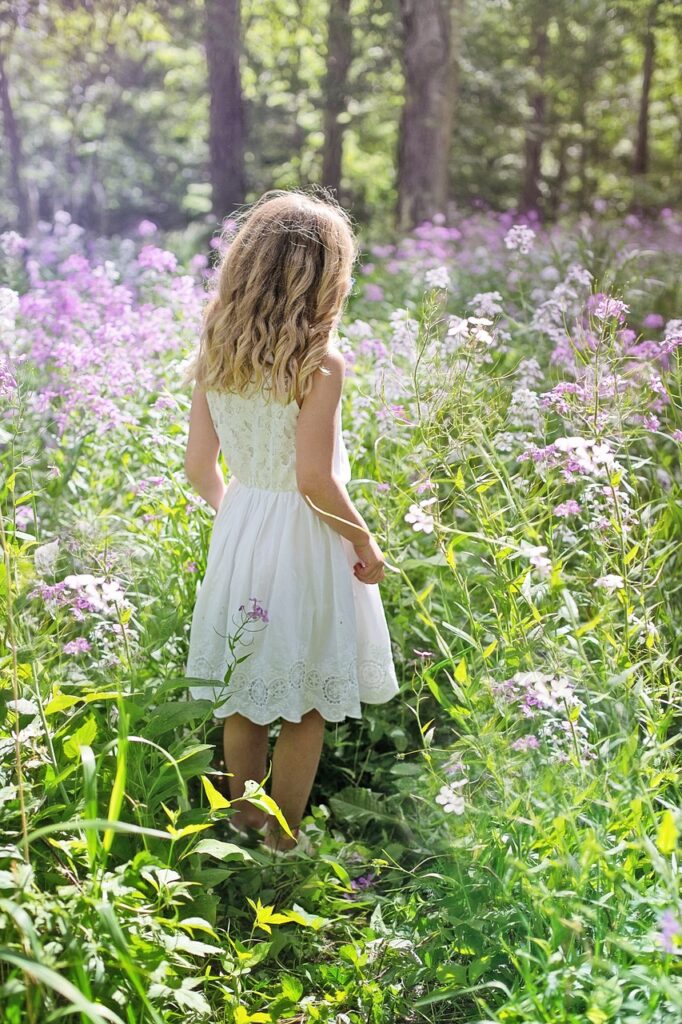 child, girl, wildflowers