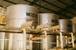 View of a Row of Containers in a Distillery